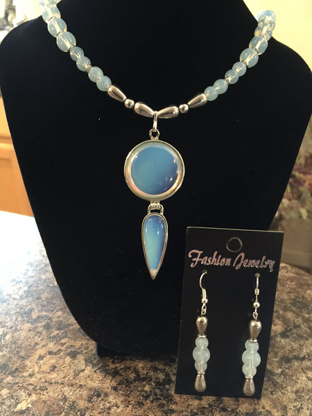 Opalite Moonstoney - a reverse teardrop hangs from a perfect circle creating a simple and elegant necklace